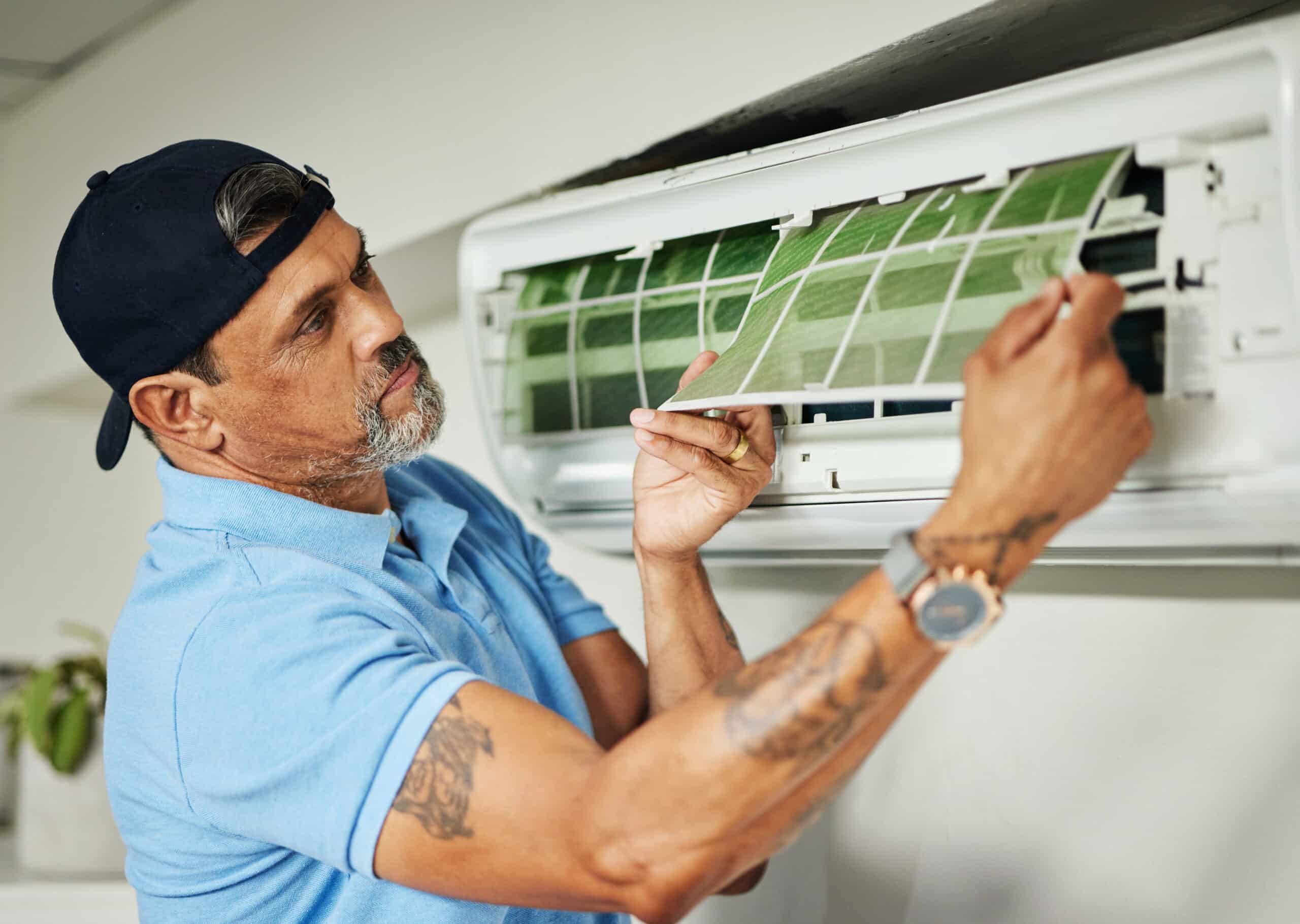 image of AC technician teaching how an ac works